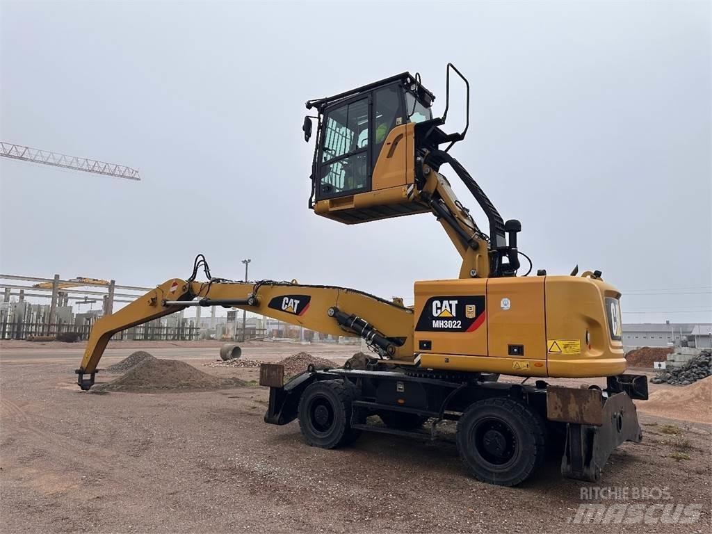 CAT MH3022 Pyöräkaivukoneet