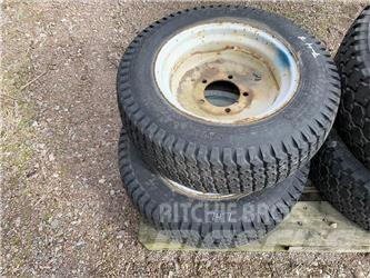  27X8.50-15 Renkaat ja vanteet