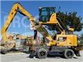CAT MH3024 Jätteenkäsittelijät