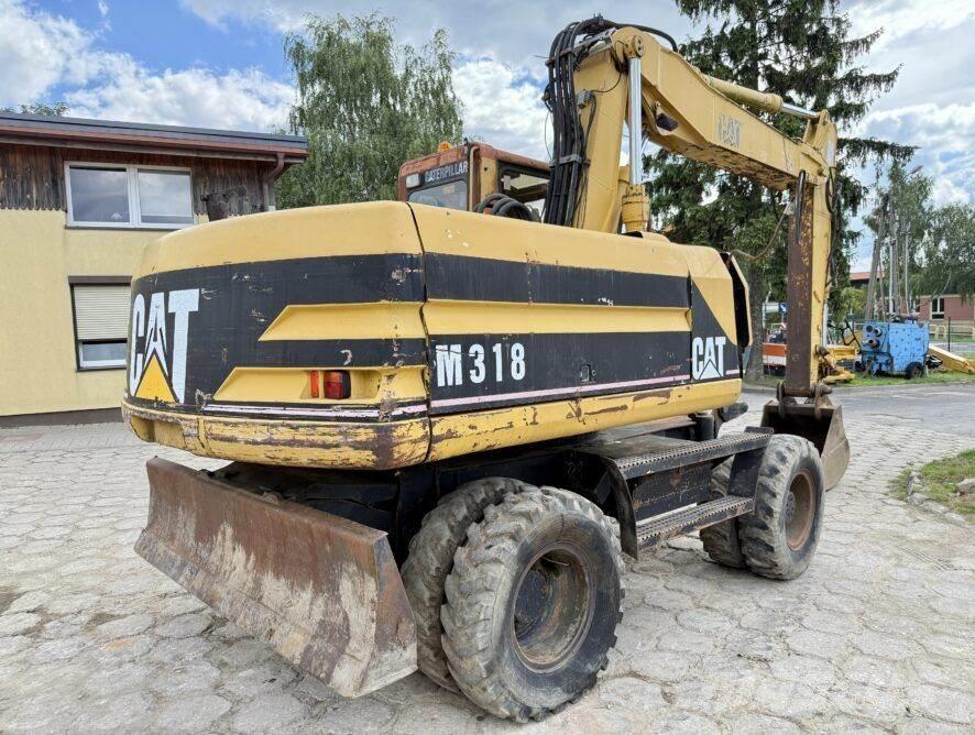 CAT M318 Pyöräkaivukoneet