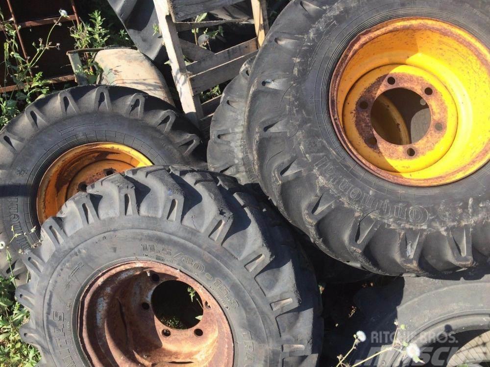  Dumper wheel and tyre 11.5/80 - 15.3 £60 plus vat  Renkaat ja vanteet