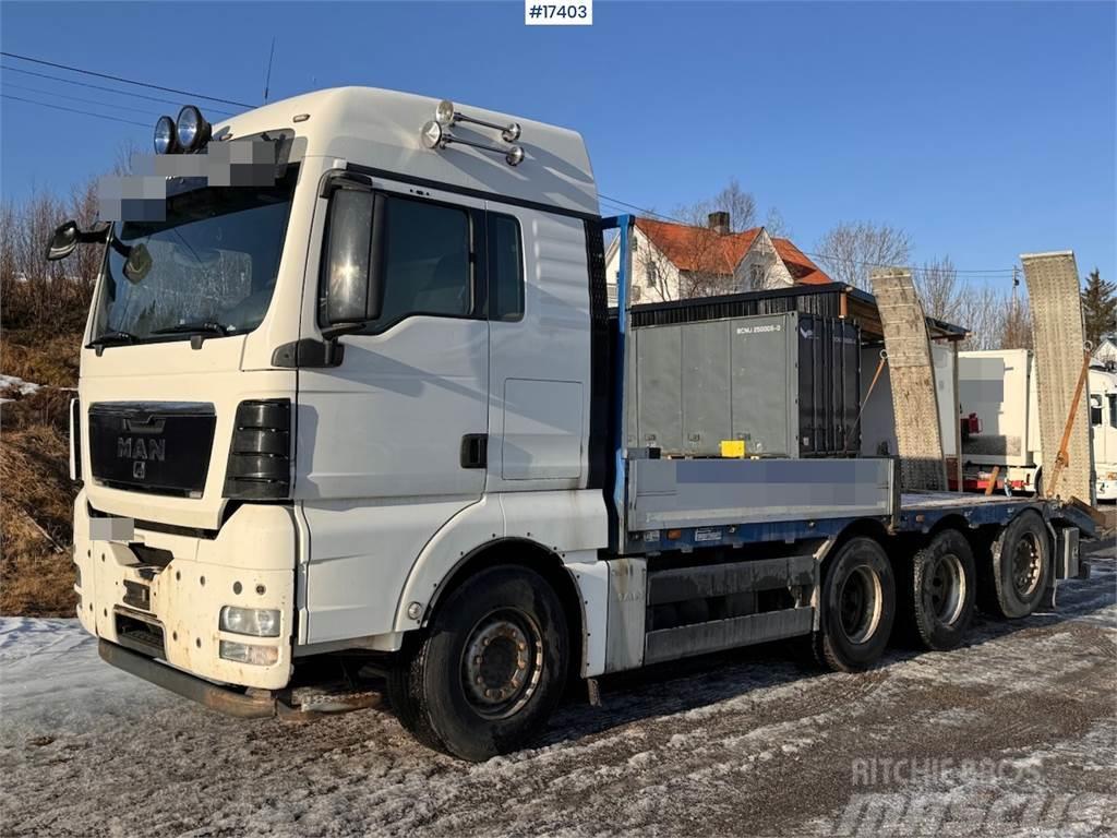 MAN TGX 35.480 8x4 flatbed truck w/ driving bridges Lava-kuorma-autot